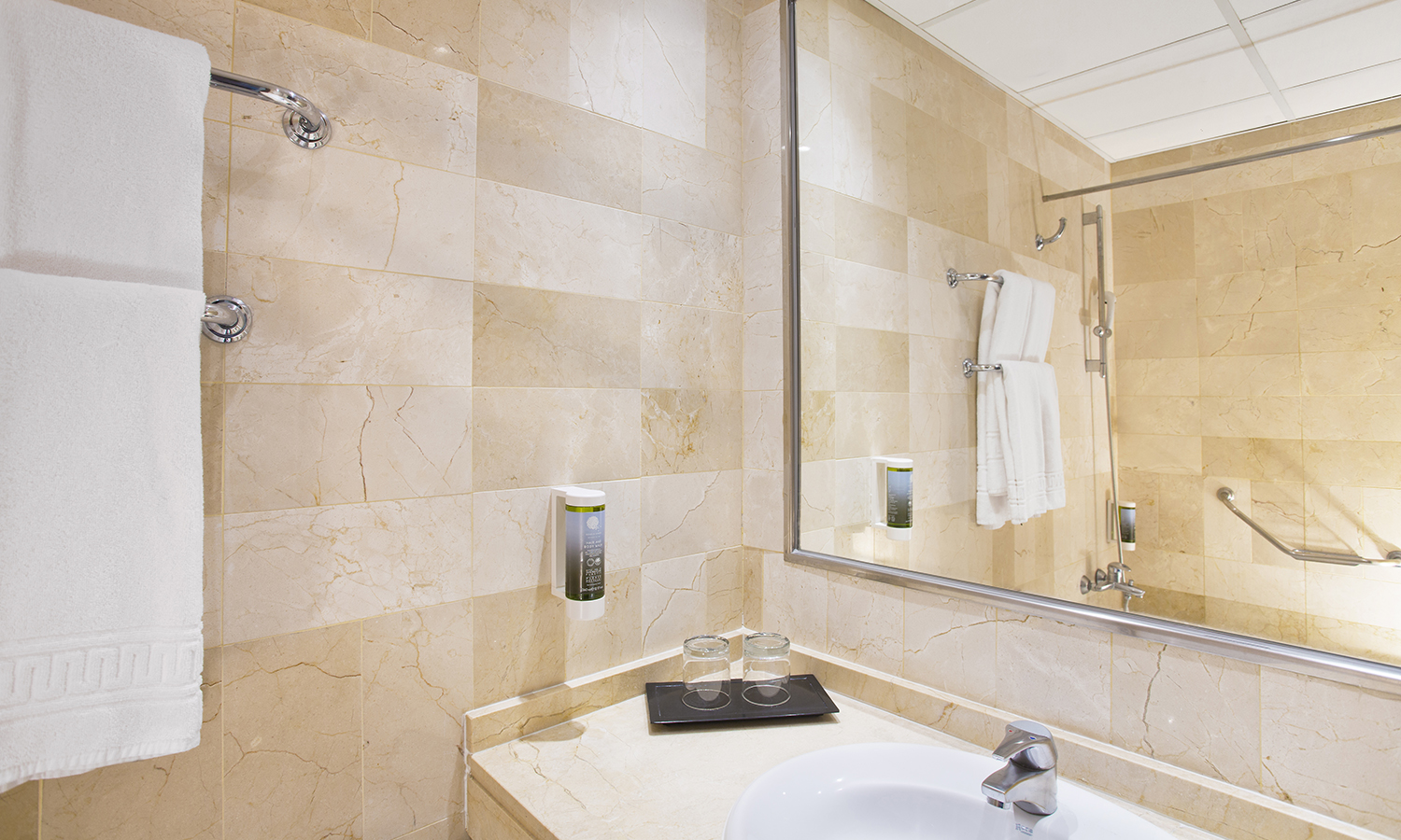 Bathroom with bath and hairdryer